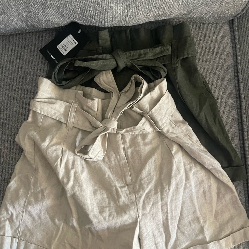 Green and tan pair of shorts